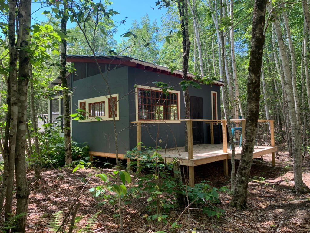 Beautiful cabin in the woods built by carpenter Excel Bangor