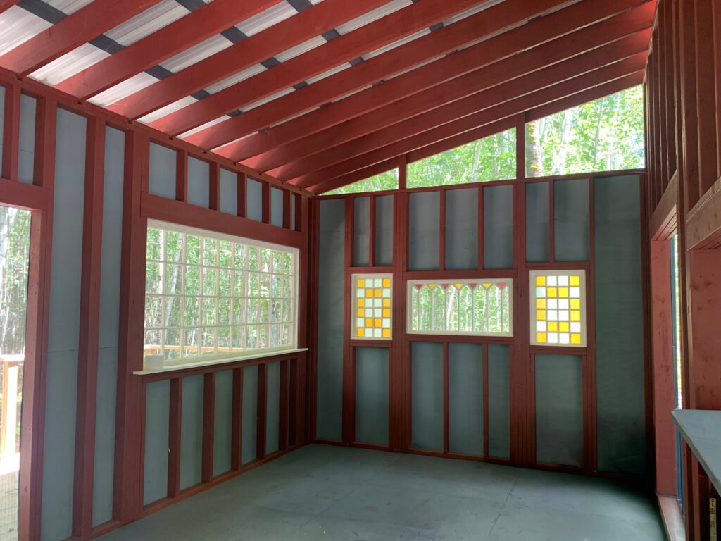 Cabin interior, stained glass windows, near Bangor Maine